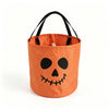 An orange Halloween trick-or-treat bag with a black jack-o'-lantern face and black handles.