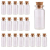 A collection of clear glass bottles with cork stoppers for DIY decor.