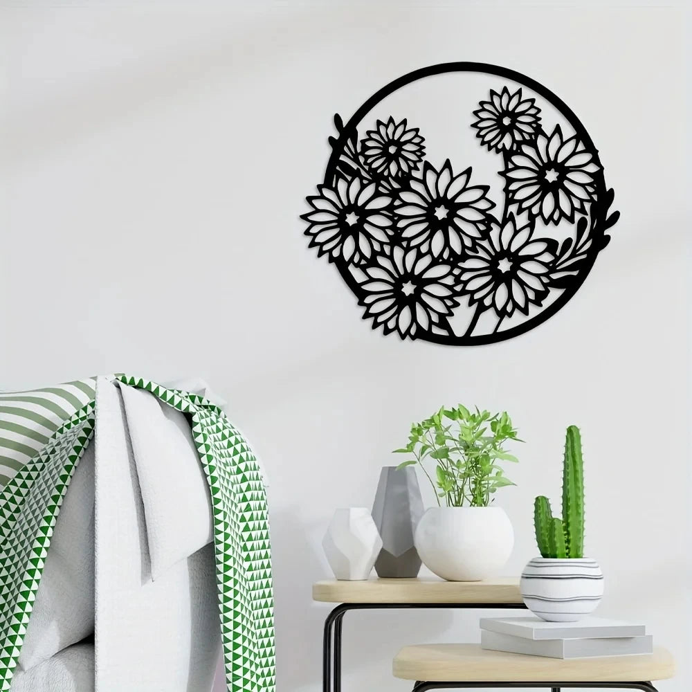 Black metal flower wall art set featuring a wreath design displayed on a white wall.
