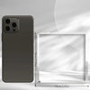 A dark gray smartphone is shown next to a clear acrylic box, illustrating the size of the phone.