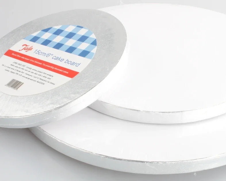A set of round cake boards, including a blue and white checkered board, is shown in silver and white.