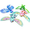A set of three articulated 3D printed owl figurines in shades of blue, green, and pink.