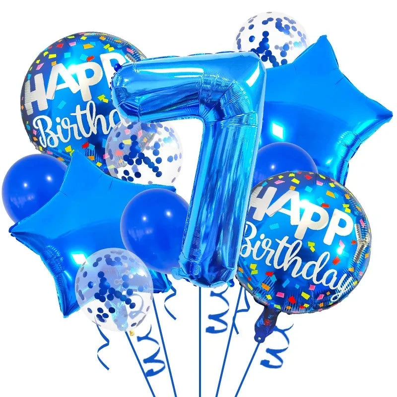 A set of navy and gold foil balloons shaped like the number 7 and a star for a birthday celebration