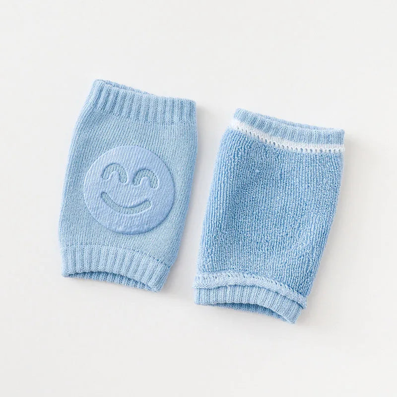 Light blue knitted knee pads for crawling infants