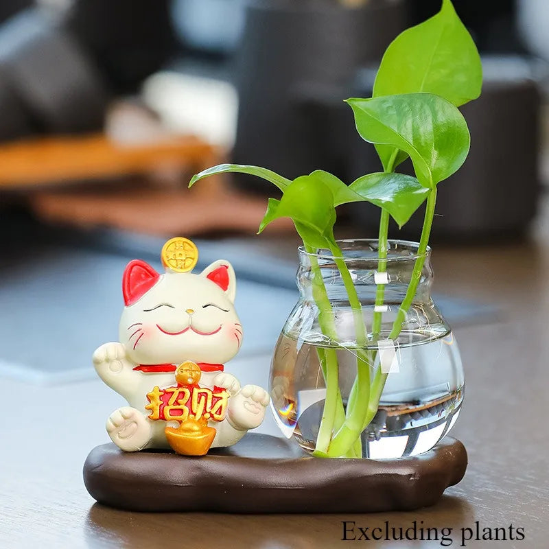 Mini resin desk ornament featuring a lucky cat figurine with a green ivy plant in a glass vase