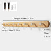 Solid beech wood wall hook rack with four hooks shown in various sizes and dimensions.
