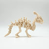 A light beige 3D printed dinosaur skeleton model displayed against a white background.