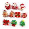 Un set de lindos imanes navideños para nevera con Santa Claus, un muñeco de nieve, una caja de regalo festiva, un reno, un la