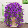 A dense display of purple artificial morning glory hanging vines in a white planter box.