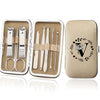 An open leather case displaying an 8-piece stainless steel manicure and pedicure kit with various tools.