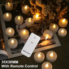 A set of white LED tea light candles arranged on a dark surface with a remote control nearby.