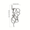 Line drawing of a minimalist abstract face design on metal wall art