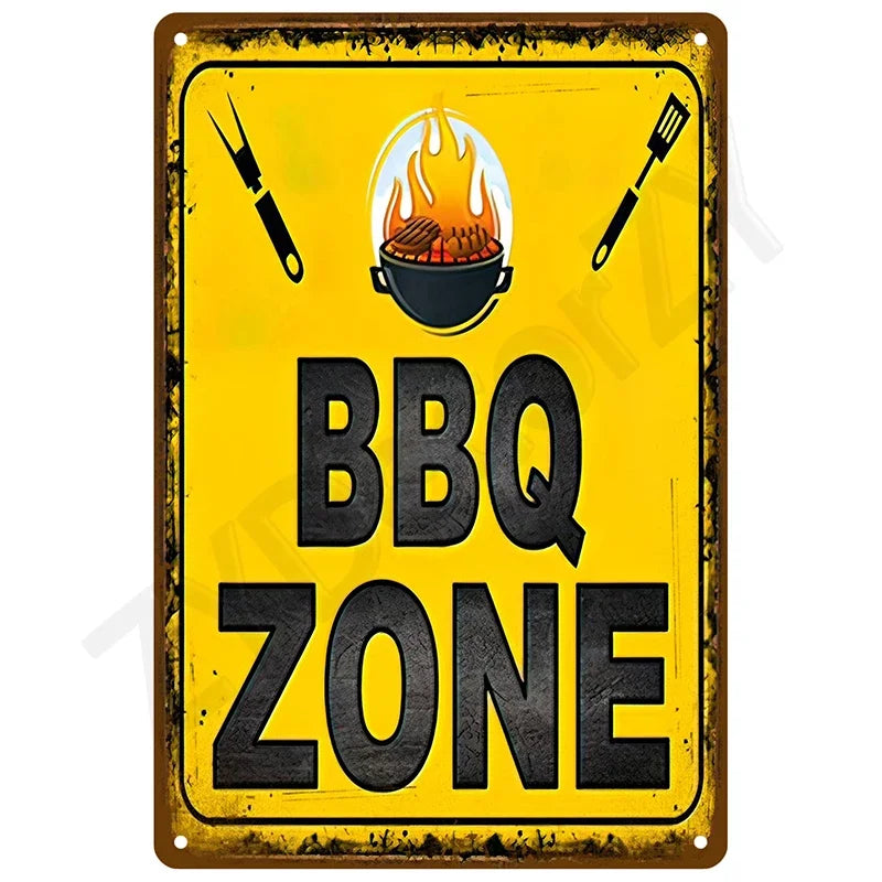 A vintage yellow tin sign with black text reading BBQ ZONE, featuring crossed utensils and a flame icon.