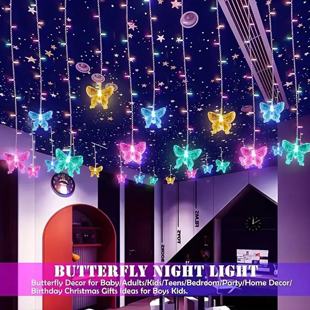 A display of colorful LED butterfly night lights hanging from the ceiling in a room setting.