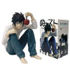 PVC figure of Death Note character Light Yagami holding a red apple, alongside packaging.