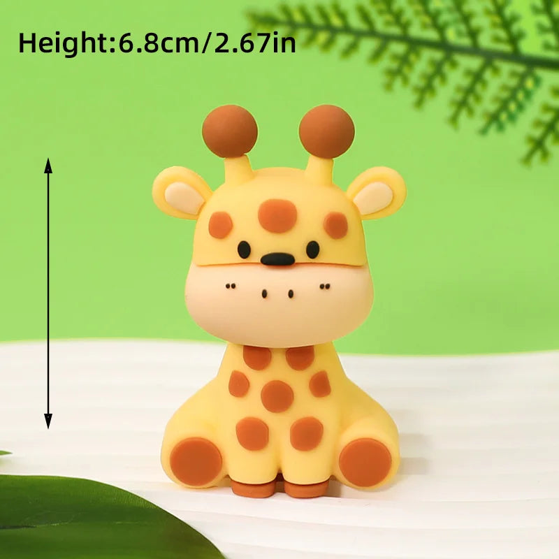 A yellow and orange spotted animal cake topper resembling a baby giraffe or cub.