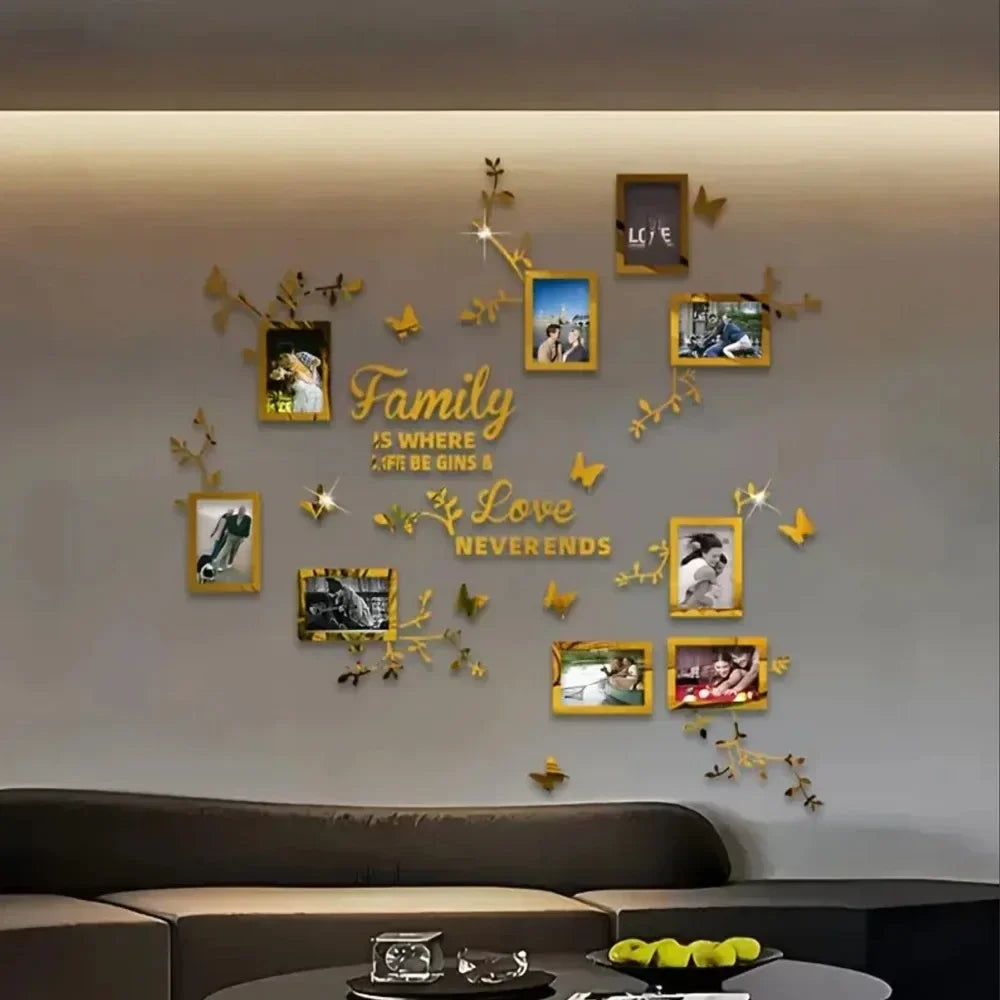 A wall decorated with gold foliage and various photo frames featuring family and love themes.