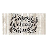 Rustic wooden hanging sign with the word Welcome written in black script surrounded by leafy vines.