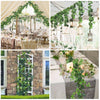 An artificial ivy garland draped across a white wooden trellis in an outdoor setting.