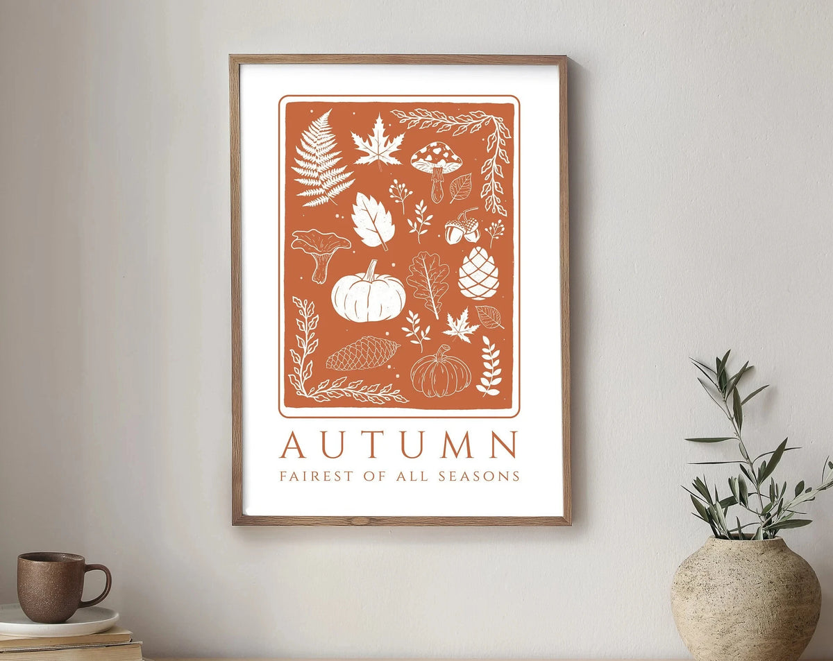 Framed canvas wall art poster featuring an orange botanical design with the word Autumn and Fairest of All Seasons