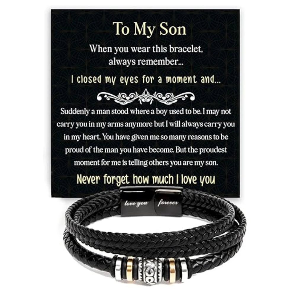 A black braided leather cuff bracelet with engraved text on a dark card.