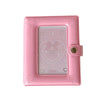 A pink compact star-shaped photo card holder album with a clear window and decorative elements.