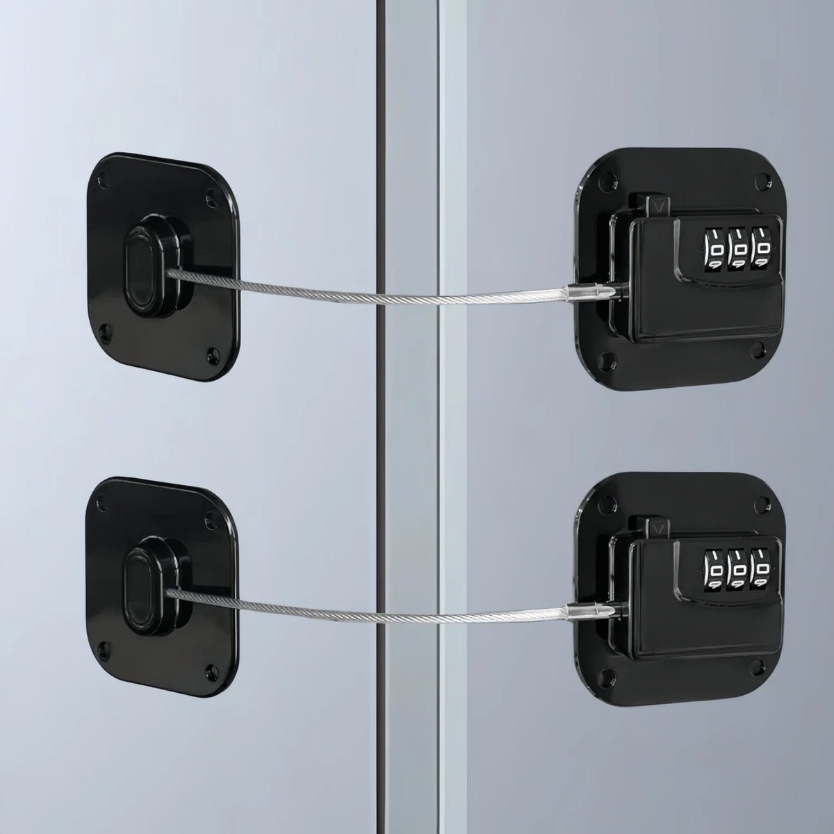 Two black stainless steel combination refrigerator locks mounted on a glass surface.