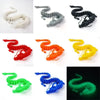 A collection of three-dimensional printed dragon ornaments in various colors including white, gray, red, orange, yellow, and 