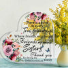Placa de acrílico transparente con diseño floral y texto que dice: Hay un punto en toda amistad verdadera donde los amigos st