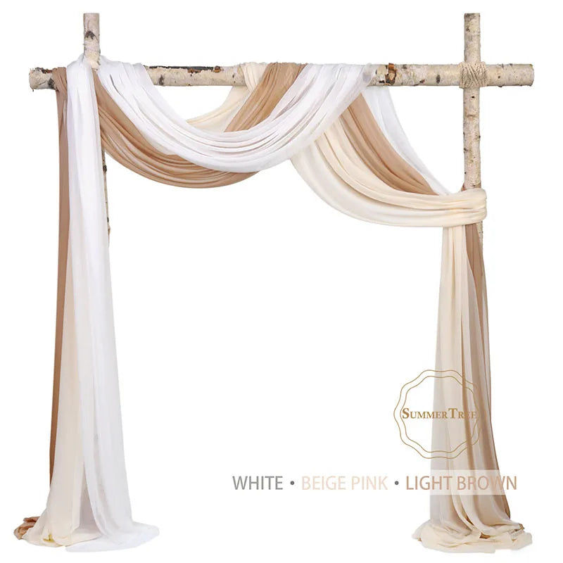 White beige pink and light brown chiffon fabric draped on a wooden wedding arch display