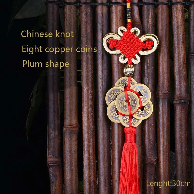 Chinese knot pendant featuring eight copper coins in a plum shape hanging from a red tassel