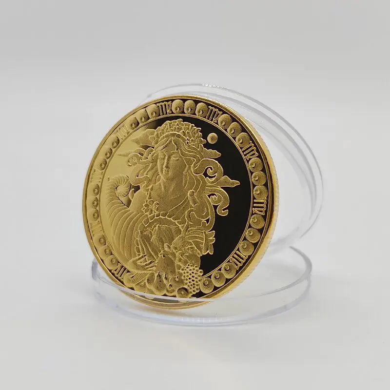 A round gold commemorative iron coin featuring a detailed zodiac symbol relief.