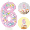 Pink glitter number 6 birthday candle and cupcake set for a celebration