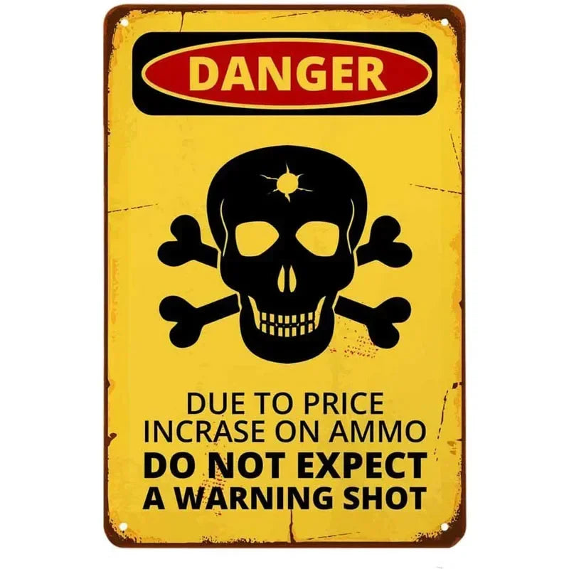 Vintage yellow and black sign with a skull and crossbones warning that says Danger Do not expect a warning shot