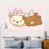 A pink tapestry featuring a cute cartoon bear with pink ears and a brown bear, suitable for wall hanging.