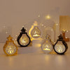 A set of elegant LED star and moon lanterns displayed on a white surface with soft lighting.