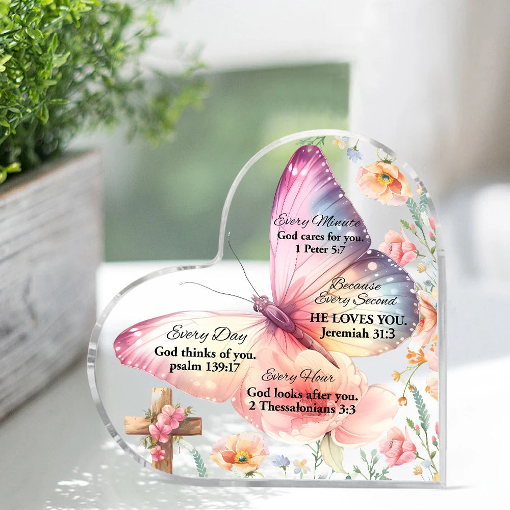 Heart-shaped acrylic decor featuring a pink and yellow butterfly design with inspirational Bible verses