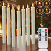 A set of white LED taper candles displayed in a fireplace setting with a remote control and timer visible.