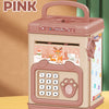 A pink electronic ATM piggy bank with a password lock for kids sitting on a wooden surface.