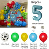 A colorful latex balloon garland kit featuring blue, green, and red balloons arranged around a sign with the name REEGAN.