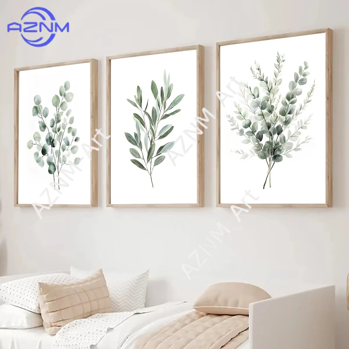 A set of three framed botanical leaf art prints featuring sage green foliage on white backgrounds.