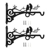 Black vintage iron wall hooks featuring stylized branches and birds for plant and garden decor