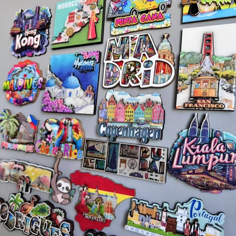 A collection of wooden fridge magnets featuring various destinations like Hong Kong, Maldives, Copenhagen, and Portugal.