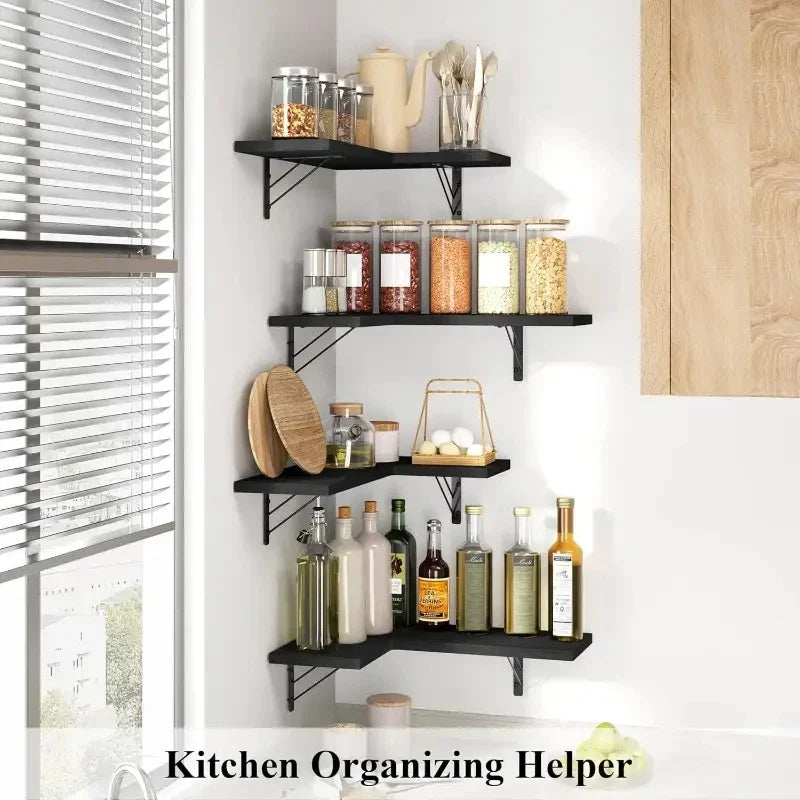 A set of black corner-mounted wood floating shelves used for kitchen organizing.