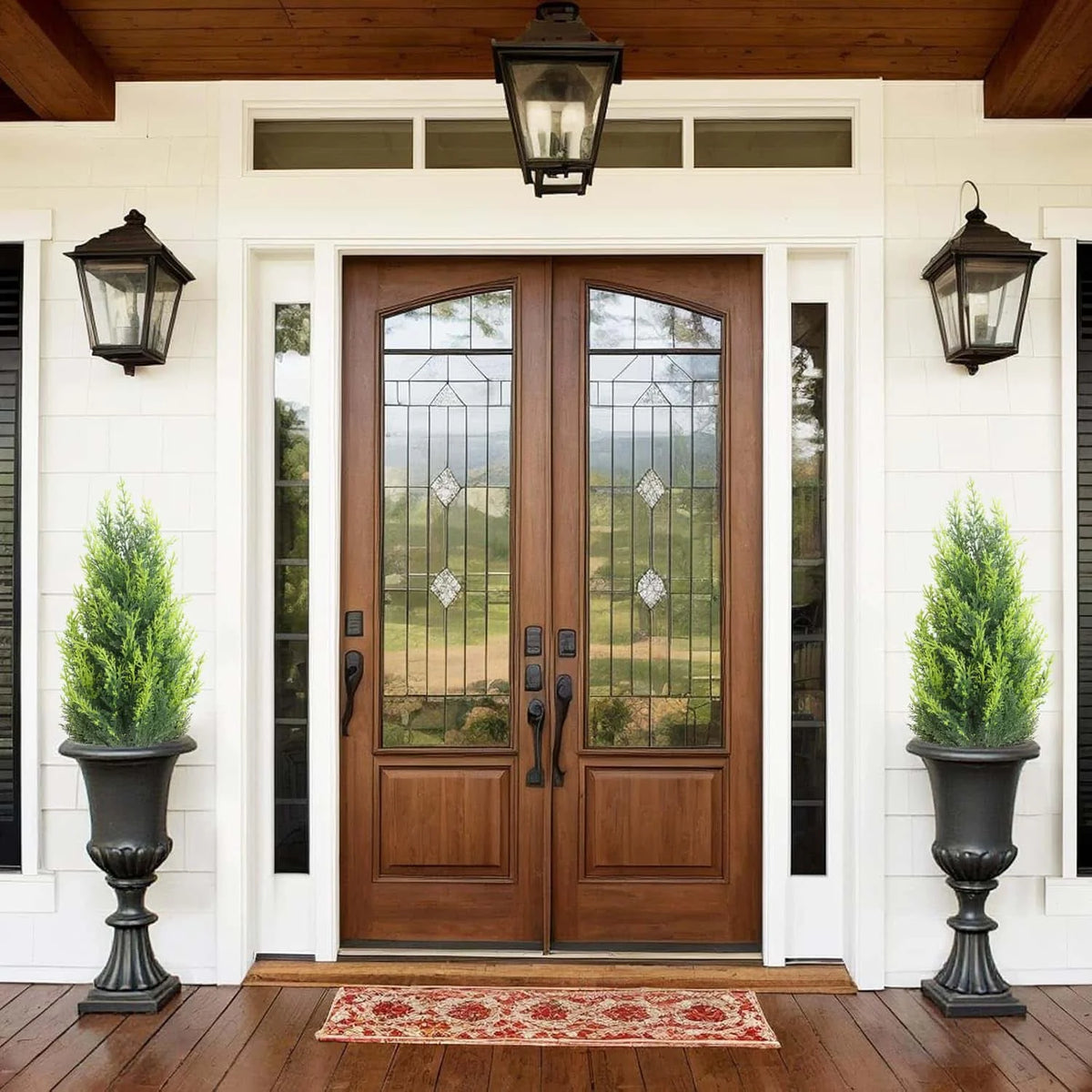 A pair of UV-resistant artificial Persian fern stakes displayed in a doorway with wooden flooring.