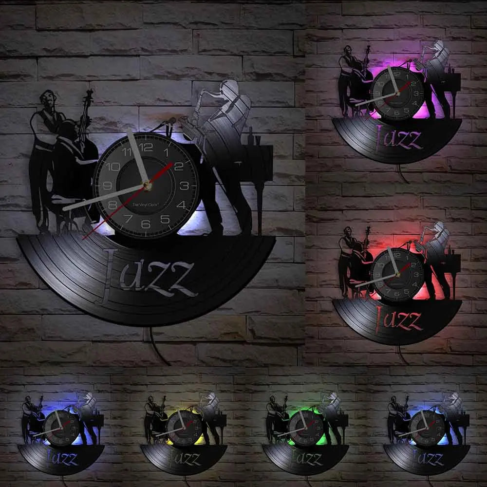A collection of vintage vinyl record wall clocks displayed on a brick wall.