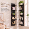 A vertical black wall shelf with five tiers displaying various decorative items like plants and small sculptures.