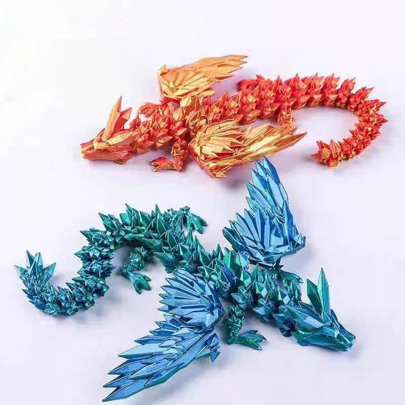A pair of 3D printed magic dragon desktop ornaments, one gold and one blue, displayed against a white background.