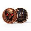 A round copper art bar featuring a detailed alien face and a dark fantasy scene.