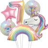 A collection of foil balloons featuring a number seven, a star, a unicorn head, and a rainbow arch.